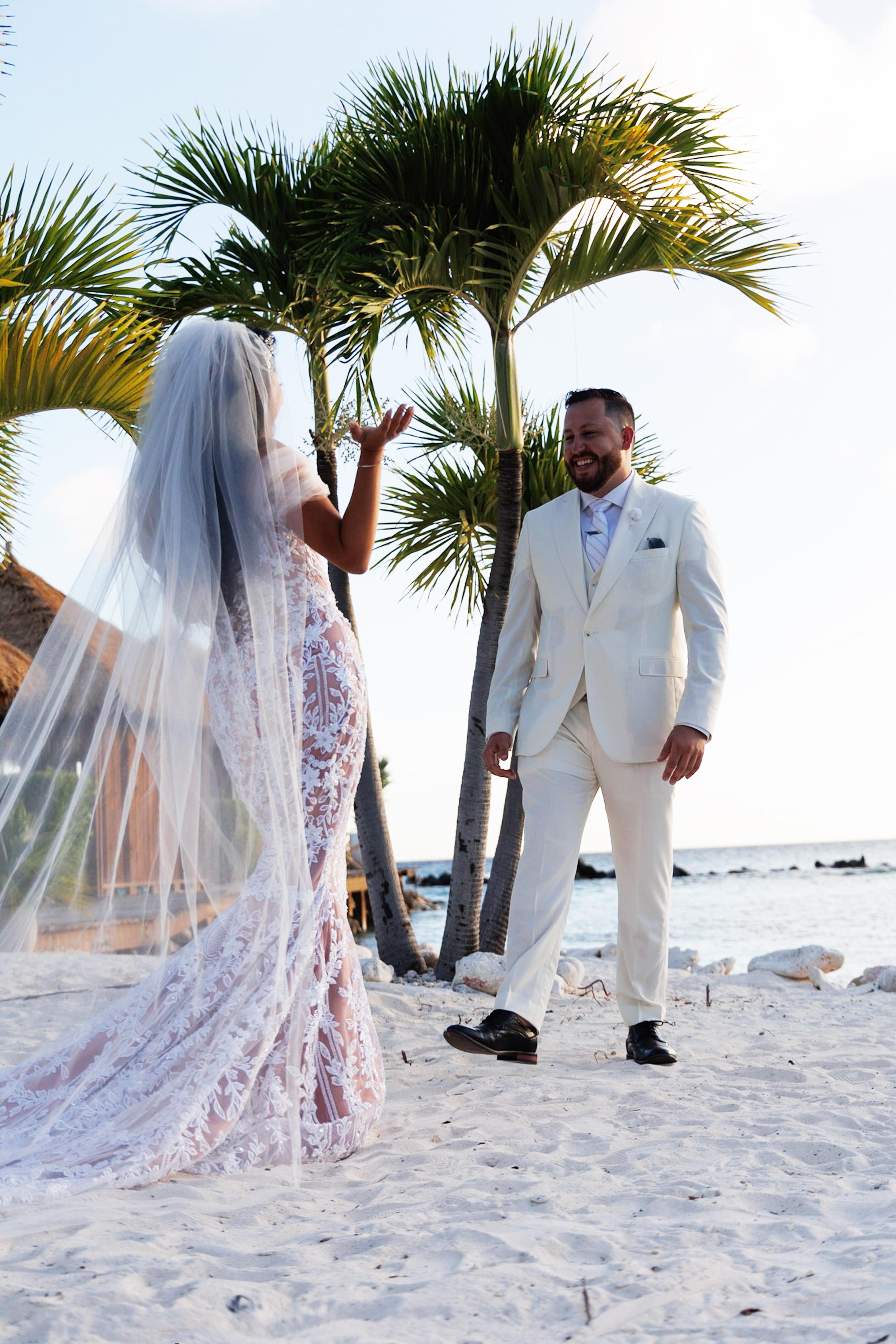 A Glamorous Summer Wedding at Renaissance Island 80