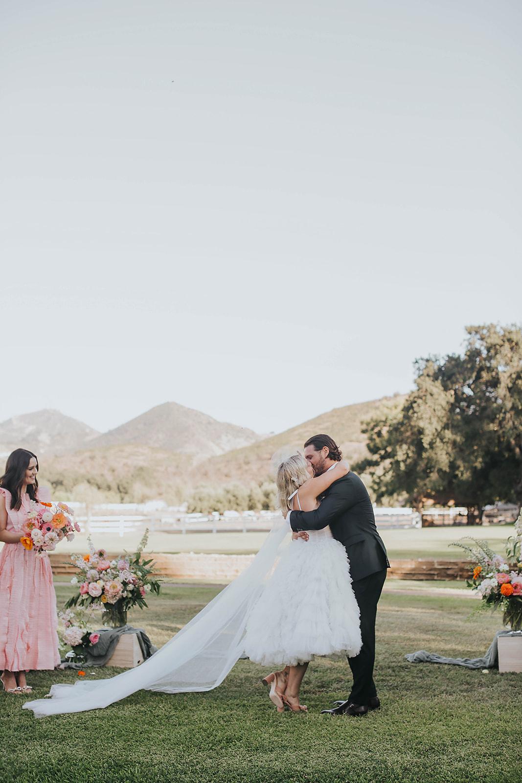 A Whimsical Summer Wedding at Saddlerock Ranch 55