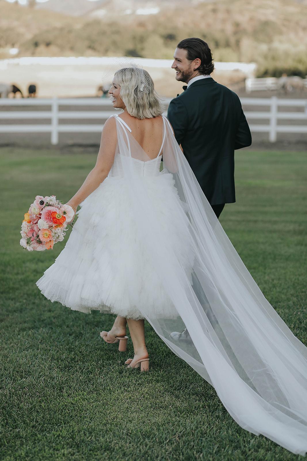 A Whimsical Summer Wedding at Saddlerock Ranch 51