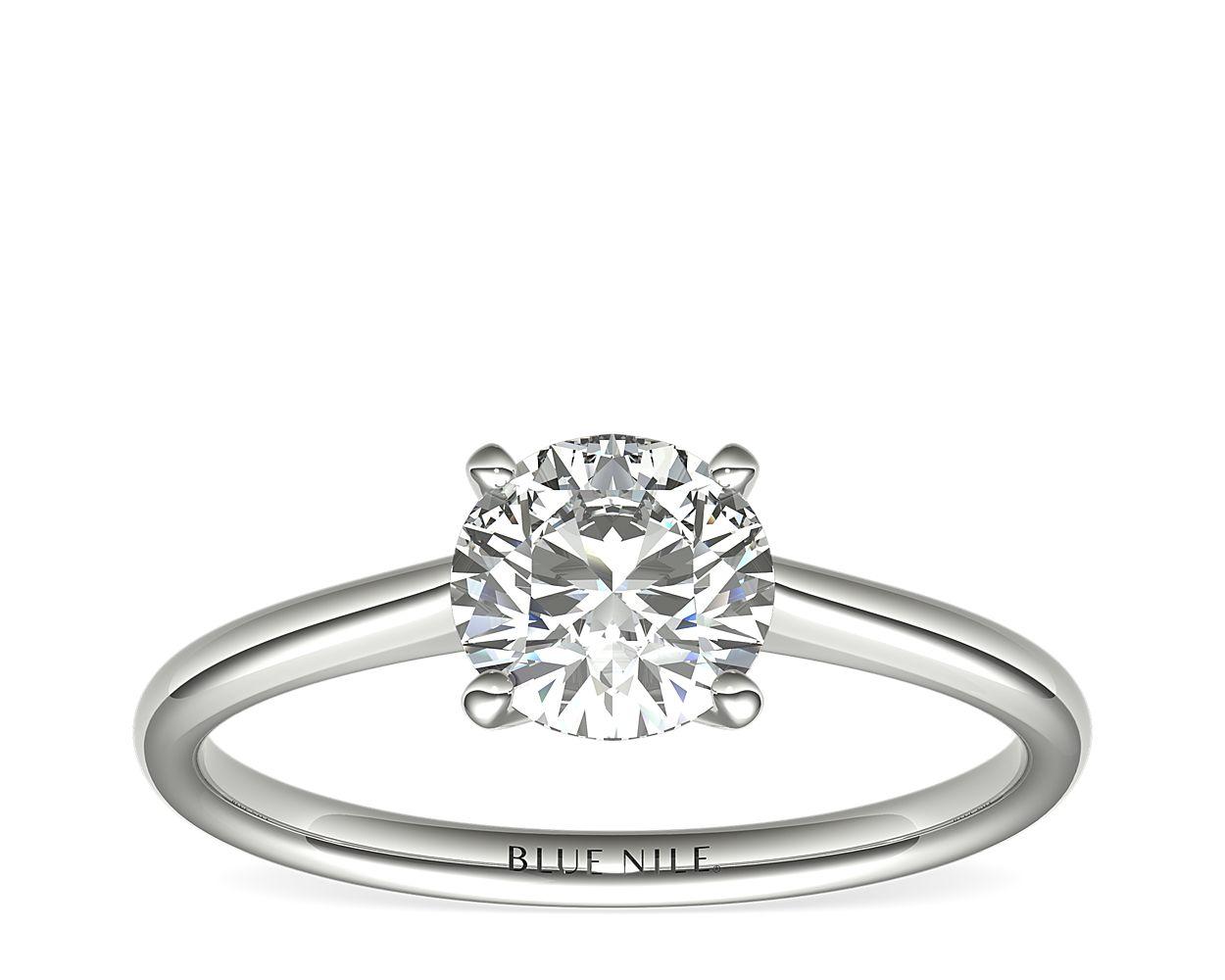 Petite Solitaire Engagement Ring In Platinum