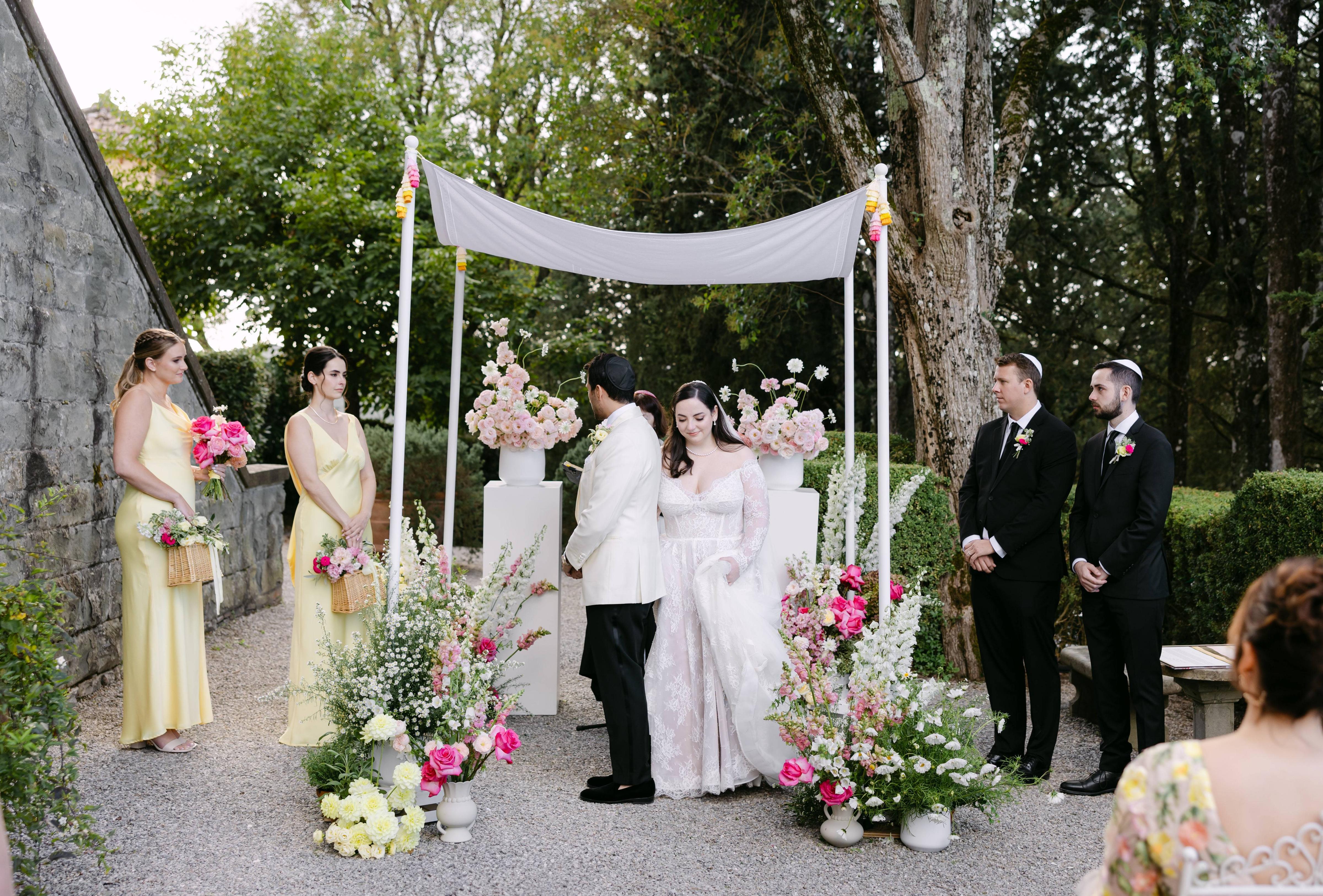 This beautiful tradition of circling the groom seven times represents the creation of a new life together and the completeness of marriage, like a wedding ring.