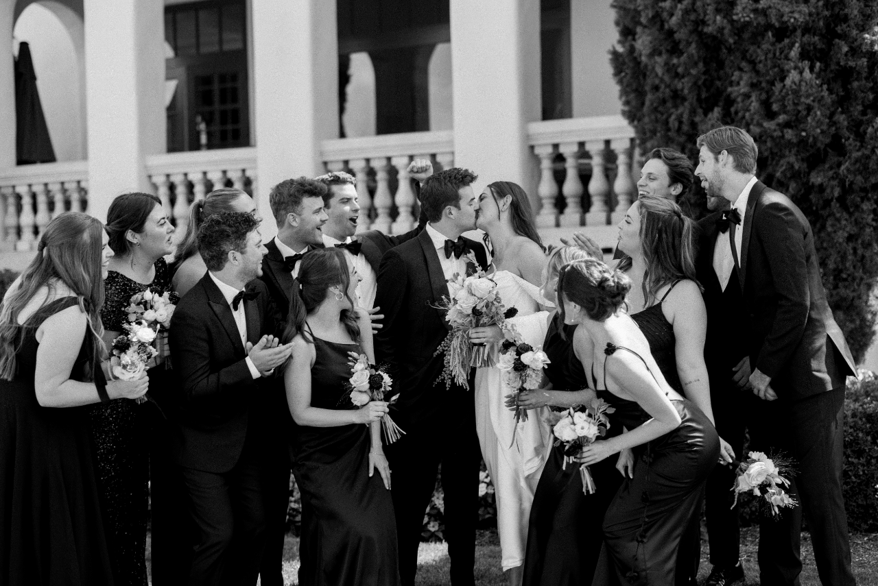 The Bridal Party Celebrating the couple