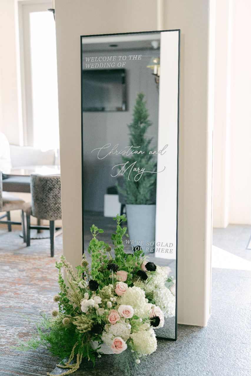 Welcome mirror  are pefect accent for guest to capture a selfie/ usie as they event the event. Remember  a pop of florals sets the tone for your event.