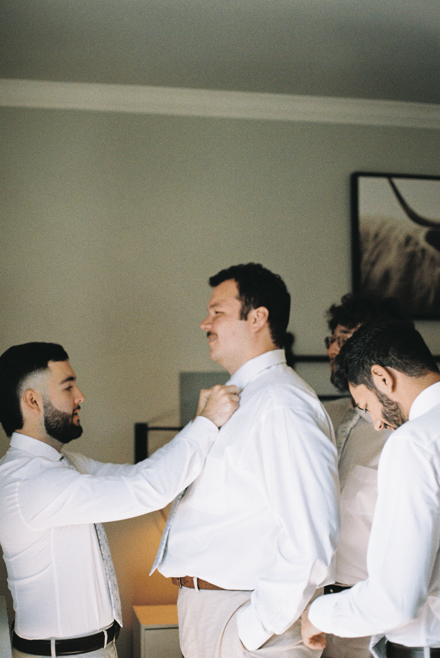 Groom getting ready with his boys on 35 mm film