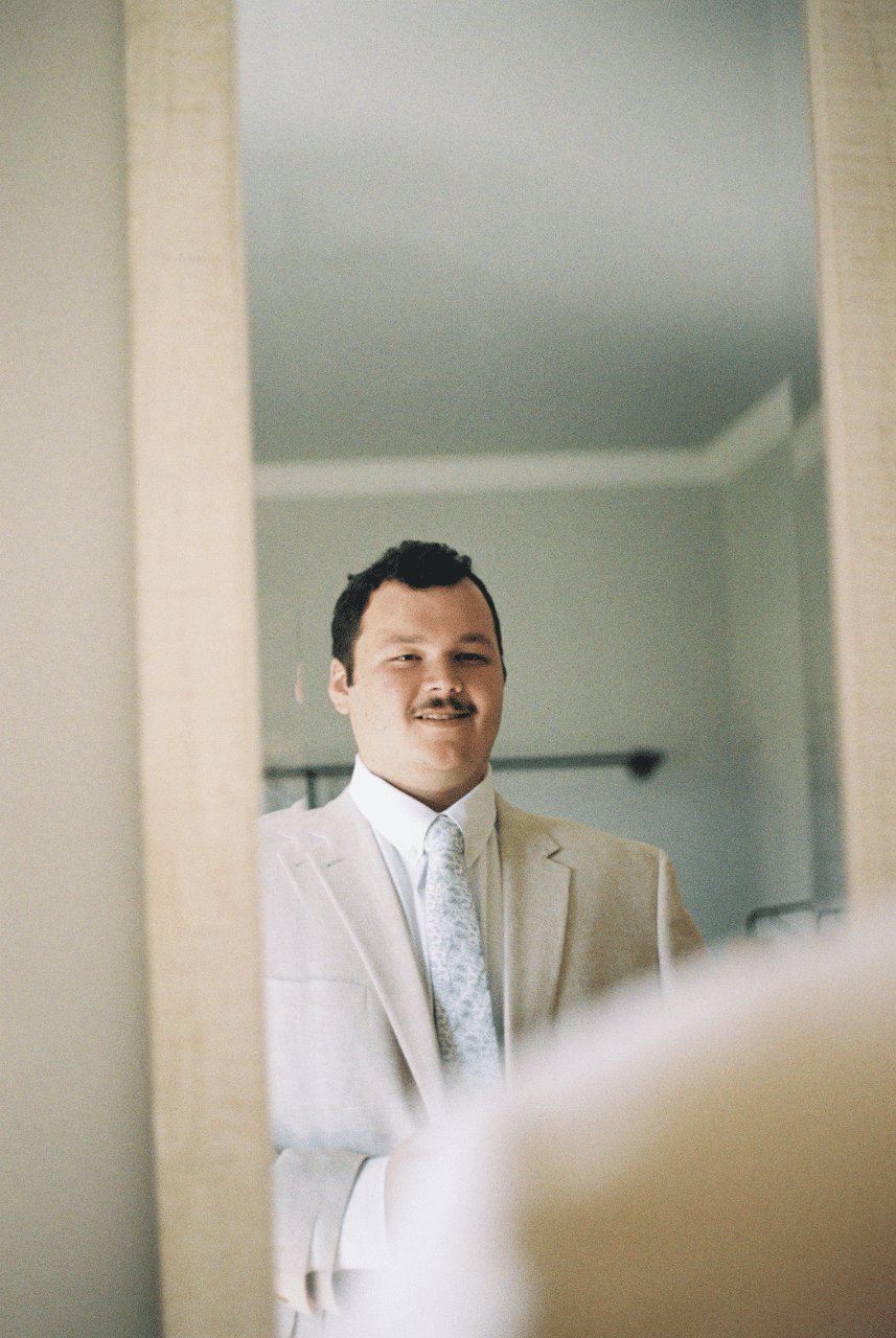 Groom taking it all in, on 35 mm film