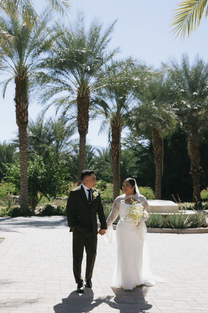 Stepping into married life beneath sunlit palms.