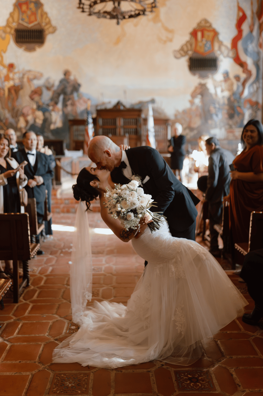 Timeless Vows Amidst the Muraled Walls of the Courthouse